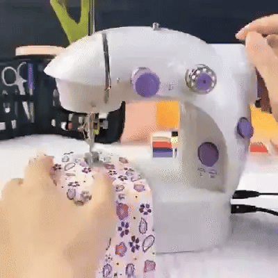 Máquina de coser portátil